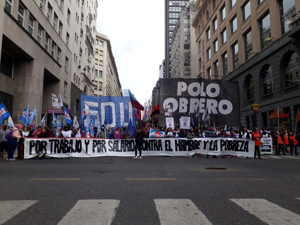 Huelga y Educacion Protesters rally in the city for labor rights and against poverty.